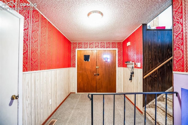 interior space with a textured ceiling