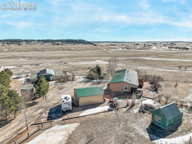 birds eye view of property featuring a rural view