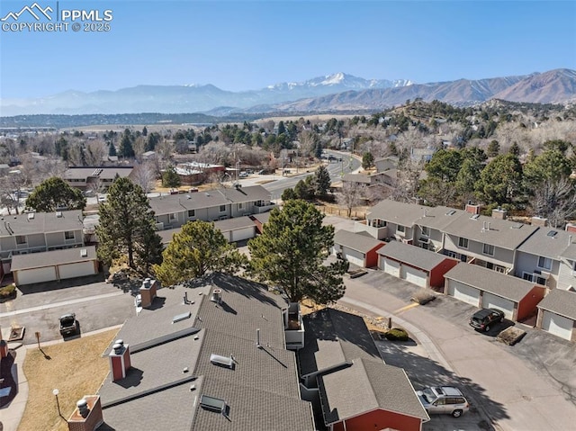 birds eye view of property featuring a mountain view