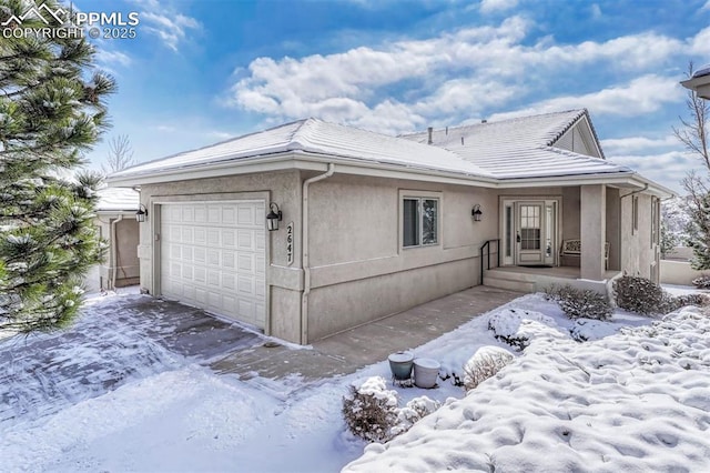 view of front of property featuring a garage