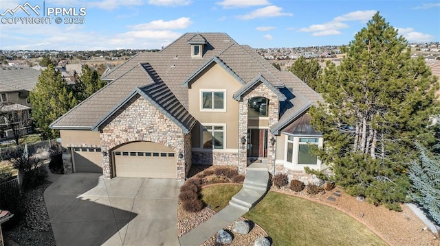 view of front of property with a garage