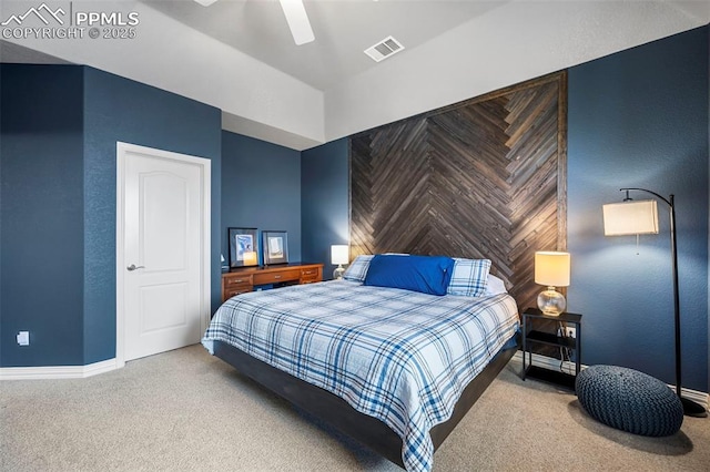 carpeted bedroom with ceiling fan