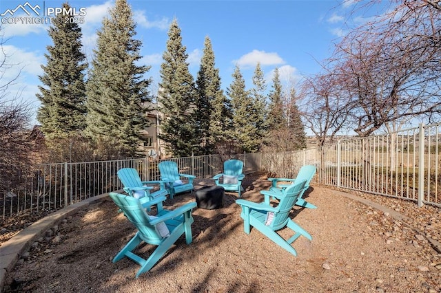 view of yard featuring a fire pit