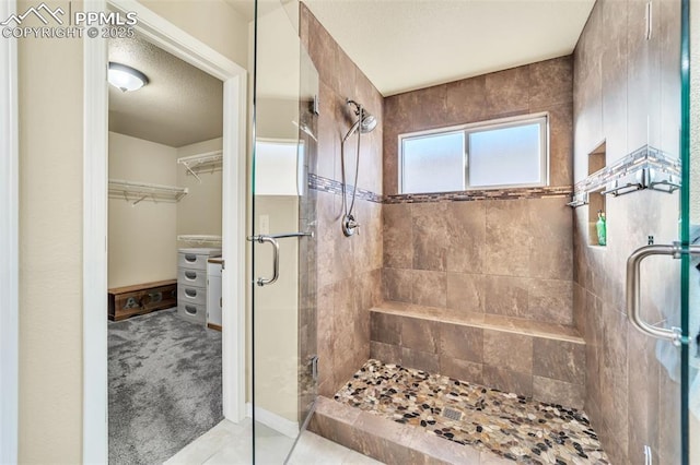 bathroom with an enclosed shower