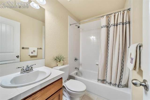 full bathroom with vanity, toilet, and shower / bath combo