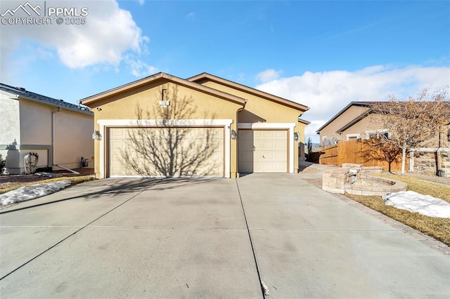 single story home featuring a garage