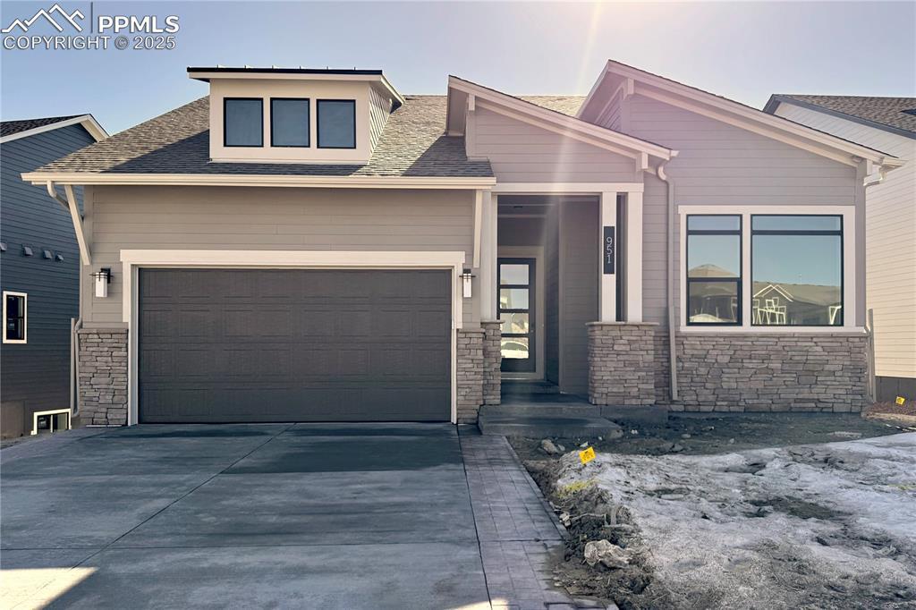 view of front of home with a garage