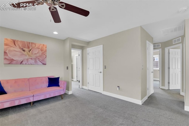 carpeted living room featuring recessed lighting, baseboards, visible vents, and ceiling fan