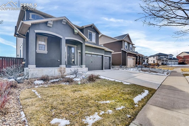 view of front of house with fence, driveway, a porch, stucco siding, and a residential view