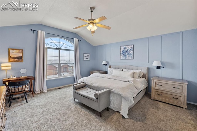 carpeted bedroom with lofted ceiling and ceiling fan