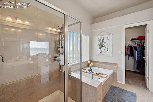 bathroom featuring independent shower and bath and tile patterned floors