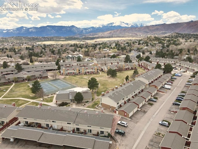 birds eye view of property with a mountain view