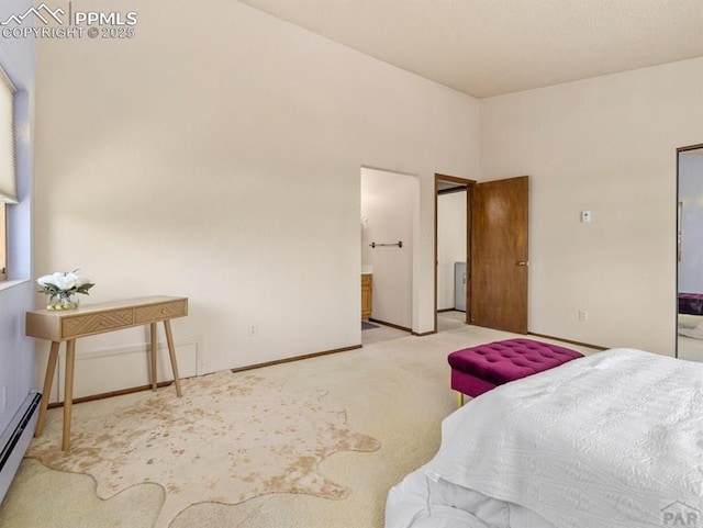 bedroom featuring baseboards, baseboard heating, and light colored carpet