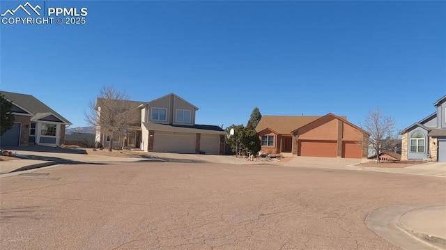 front facade with a garage