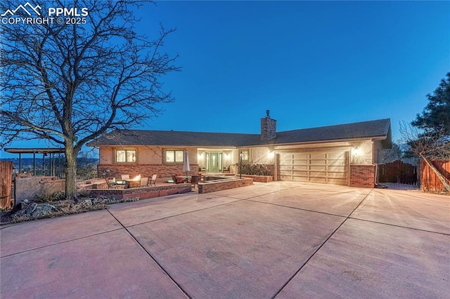 single story home featuring a garage