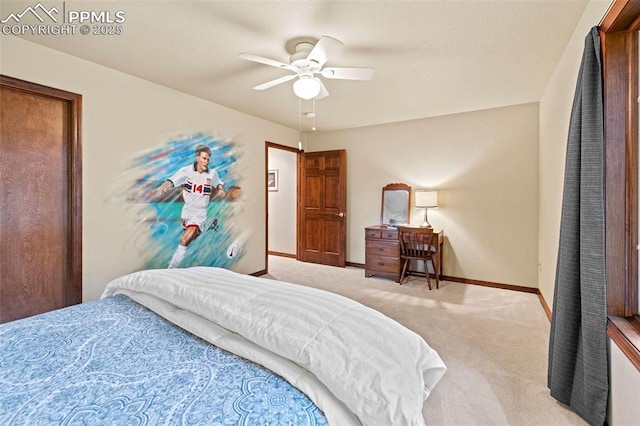 bedroom featuring baseboards, light colored carpet, and a ceiling fan