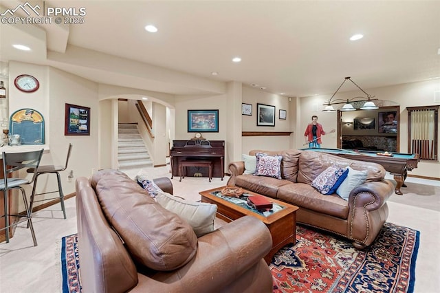 living area with recessed lighting, arched walkways, pool table, baseboards, and stairs