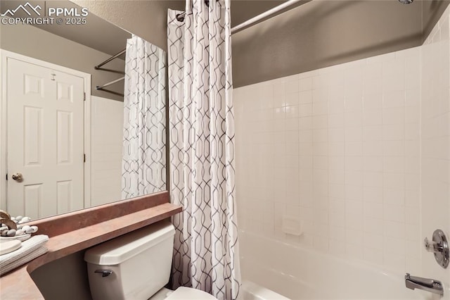 bathroom with toilet and shower / tub combo