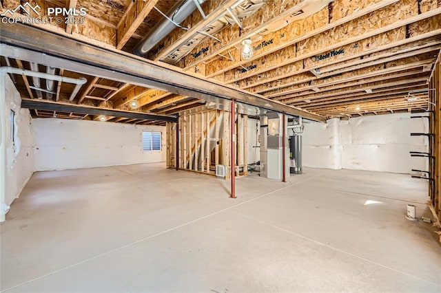 basement with water heater and heating unit