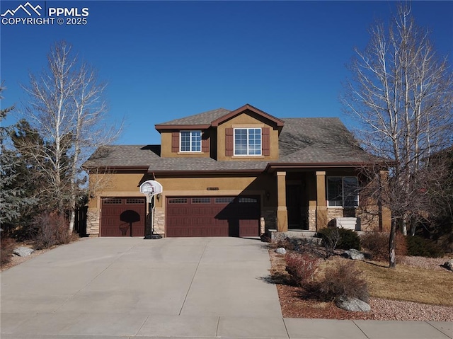 view of front of home featuring a garage and a porch