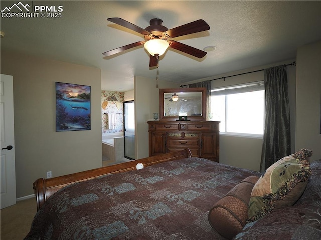 carpeted bedroom with ceiling fan and a textured ceiling