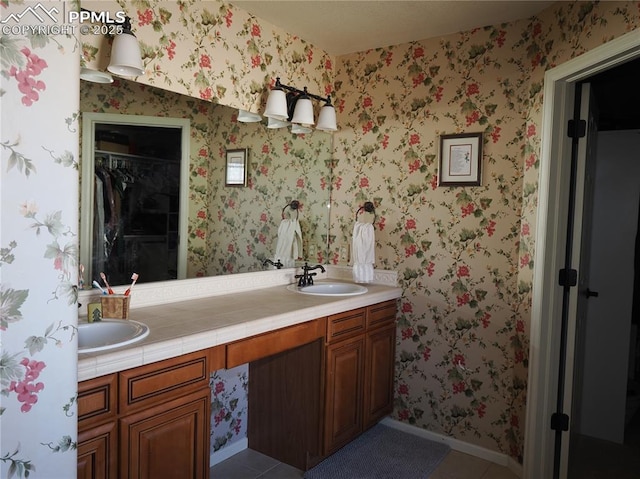 bathroom featuring vanity and tile patterned flooring