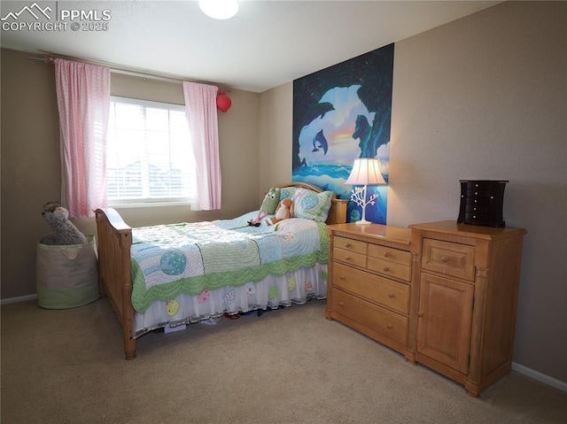 bedroom featuring light carpet