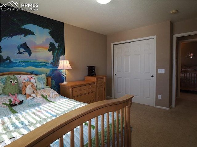 carpeted bedroom with a closet