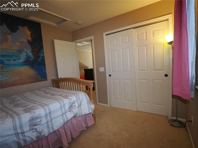 bedroom featuring carpet flooring and a closet