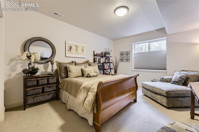 bedroom with light carpet