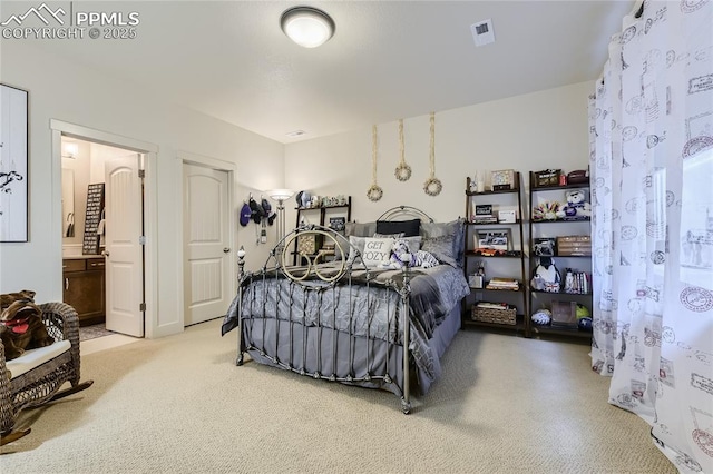 bedroom with ensuite bath