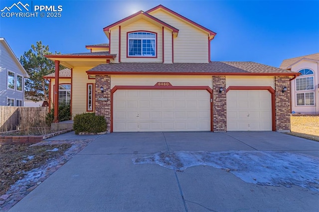 front facade with a garage