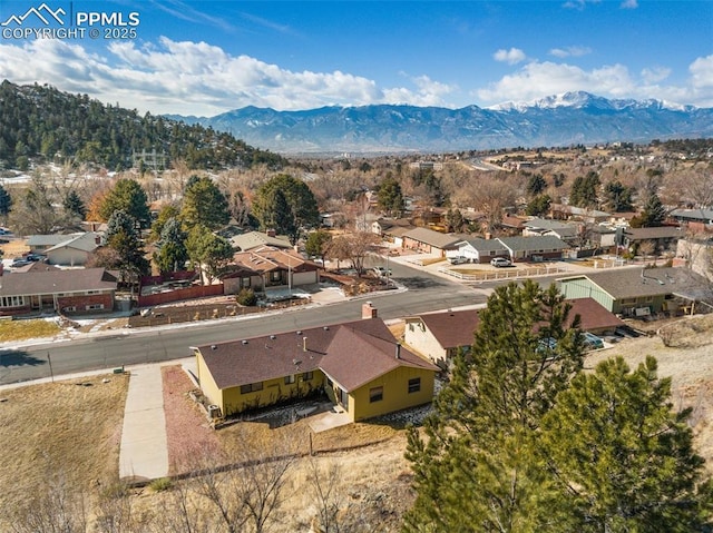 birds eye view of property featuring a mountain view