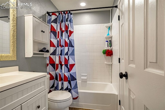 full bathroom with vanity, toilet, and shower / bath combo with shower curtain