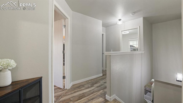 hallway featuring light hardwood / wood-style floors