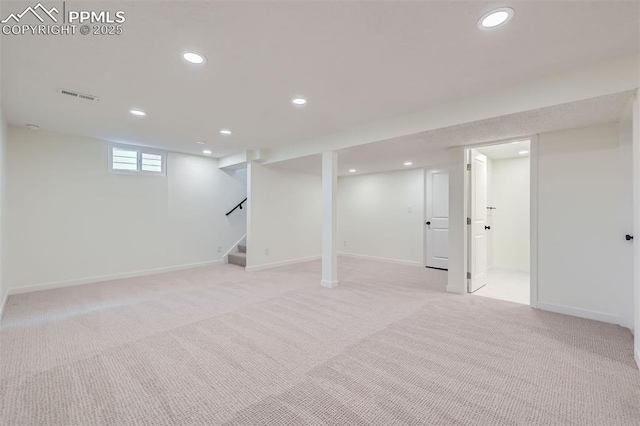 basement with light carpet