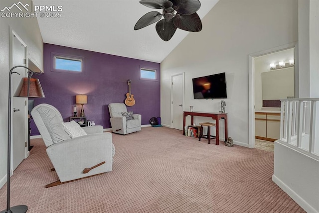 living area featuring ceiling fan, high vaulted ceiling, carpet flooring, and baseboards