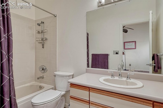 bathroom featuring vanity, toilet, and shower / tub combo with curtain