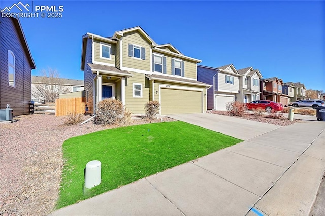 view of front of home featuring a garage and a front yard