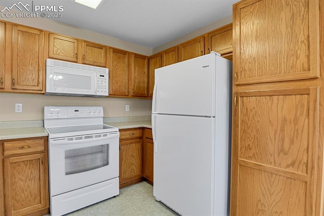 kitchen featuring white appliances