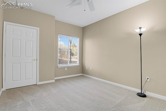 unfurnished bedroom with ceiling fan and light colored carpet