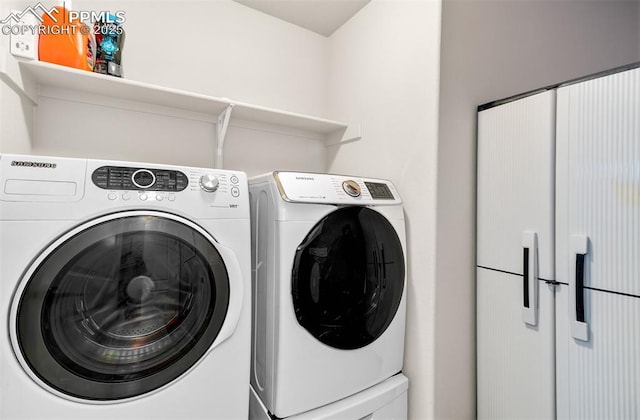 laundry area with washer and clothes dryer