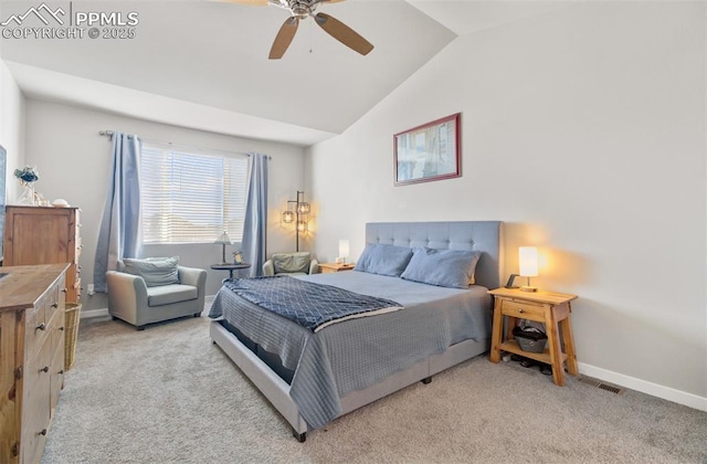 bedroom featuring ceiling fan, light colored carpet, and lofted ceiling