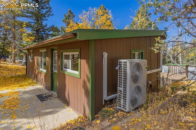 view of outdoor structure with ac unit