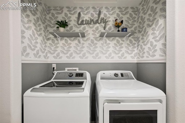 washroom featuring washing machine and dryer