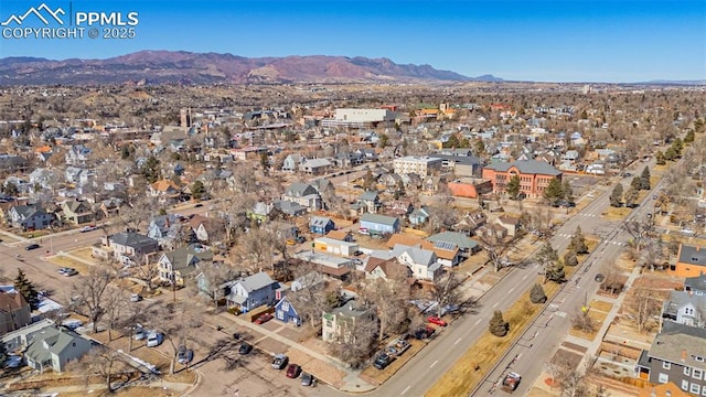 birds eye view of property with a residential view and a mountain view