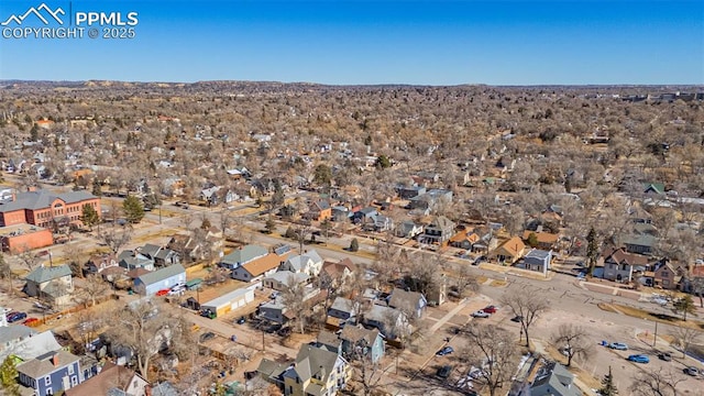 birds eye view of property with a residential view