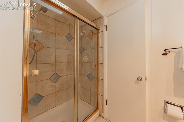 bathroom featuring an enclosed shower