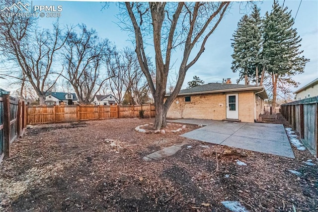 view of yard with a patio area