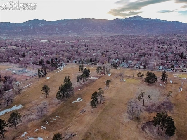 drone / aerial view featuring a mountain view